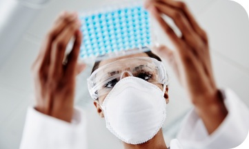 Pathologist Reviewing Lab Sample for PTEN Testing
Image Pathologist Reviewing Lab Sample for PTEN Testing Image